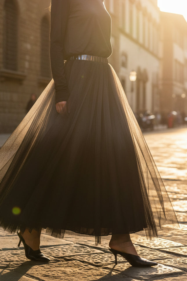 Person wearing a black outfit with a tulle skirt from Sanctamuerte collection
